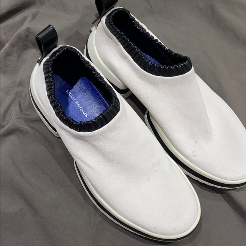White leather slip on sneaker, tiny blue stains
